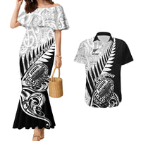 Black mermaid dress with white off-shoulder print and matching black Hawaiian rugby shirt