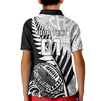 Kids black polo shirt back view with white fern and "Your Text 01" design