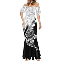 Off-shoulder mermaid maxi dress with black-and-white tribal panel print and flared hem