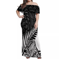 Women’s off-shoulder maxi dress with black and white tribal print, folded sleeves