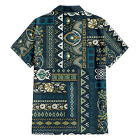 Back view of blue patchwork-pattern Hawaiian shirt with short sleeves and button-up collar.
