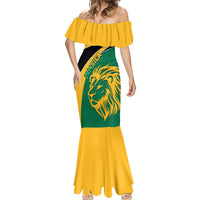 Off-shoulder mermaid dress with yellow ruffle sleeves, green lion print and long hem