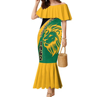 Off-shoulder mermaid dress in green with lion print and yellow ruffled sleeves