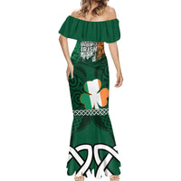 Green off-shoulder mermaid dress with 'Irish' top print, shamrock graphic, flared white hem