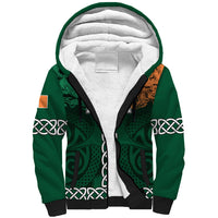Green sherpa-lined hoodie with hood, black trim, front zipper and Celtic knot graphics