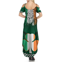 Green backless maxi dress with white shamrock and Celtic knot graphics, short sleeve bands