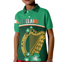Green kid polo shirt with IRELAND text and harp plus shamrock graphic on front