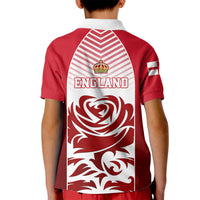 Kids red polo shirt with white back panel, England text and lion crest graphic