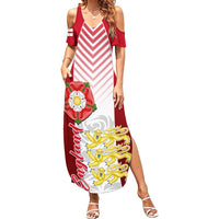 Women's off-shoulder maxi dress in red and white with chevron stripes and crest graphic
