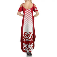 Women's open-back maxi dress with red cap sleeves and chevron stripe panel