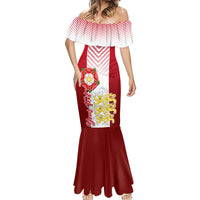 Women’s red and white off-shoulder mermaid dress with Tudor rose badge on front
