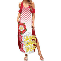 Women’s red and white maxi dress, off-shoulder short sleeves, bold crest graphic hem