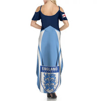 Blue off-shoulder maxi dress with back straps and England crest graphic