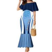 Blue off-shoulder mermaid dress with lion crest and vertical England-style stripes
