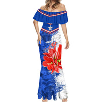Blue mermaid maxi dress with off-shoulder neckline, star, red flower and silver accents