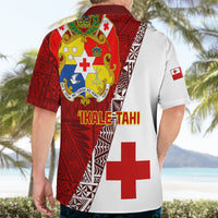 Back view of red and white Tonga rugby shirt with “IKALE TAHI” and large cross