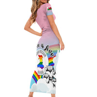 Pink fitted short-sleeve dress with rainbow Welsh dragon, fists, and PRIDE Cymru text