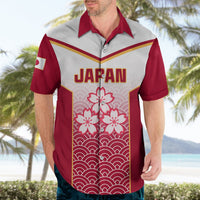 Red and white rugby shirt with JAPAN front text and cherry blossom wave panel