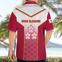 Red and white rugby shirt back view with Brave Blossoms text and cherry blossom wave print