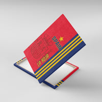 Tilted view of red and blue Spain football canvas wall art with stripes and crest