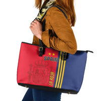 Red, blue and yellow Spain-themed leather tote bag with black straps and zipper top