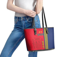 Leather Spain tote bag with black straps, red front, blue sides, and gold trim stripes