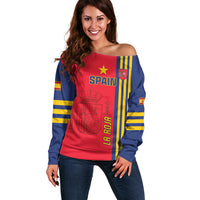 Red off-shoulder football sweater with Spain crest and blue sleeves, yellow stripe bands