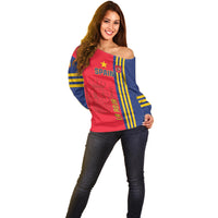 Off-shoulder Spain graphic sweater in red with blue-and-yellow striped sleeves