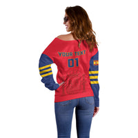 Red off-shoulder sweater back view with 'YOUR TEXT' and '01' over crest, striped sleeves