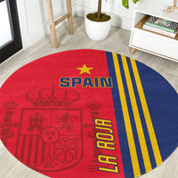 Round Spain flag carpet with red crest pattern, blue half, yellow stripes, and gold stars