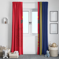 Red and blue Spain-themed curtains framing a window, vertical 'LA ROJA' text.