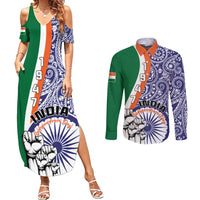 Green and blue paisley maxi dress with graphic hem, paired with long-sleeve button shirt