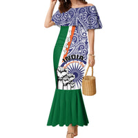 Women’s mermaid dress with off-shoulder blue paisley top and green ruffled hem