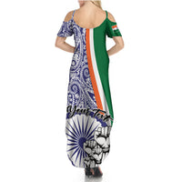 Women’s cold-shoulder maxi dress back view, green-and-navy paisley with India graphic