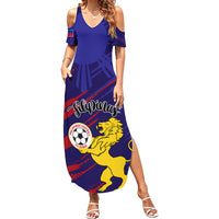 Women's blue off-shoulder maxi dress with red accents and lion crest graphic