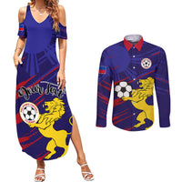 Blue maxi dress with off-shoulder cutout and matching long-sleeve button shirt, sports print