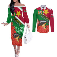 personalised-suriname-independence-day-couples-matching-off-the-shoulder-long-sleeve-dress-and-long-sleeve-button-shirt-lesser-kiskadee-with-scarlet-jungle-flame-flower