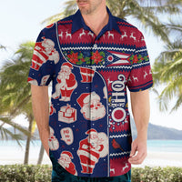 Blue and red short-sleeve button-up Hawaiian shirt with Santa, gifts, and reindeer pattern.