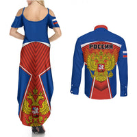 Back view: blue maxi dress and blue long-sleeve button-up shirt with red eagle graphic