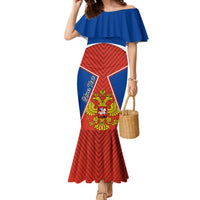 Off-shoulder mermaid dress with blue ruffle top, red chevron skirt, and crest panel