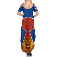 Women’s blue cold-shoulder maxi dress with open back and red eagle graphic front
