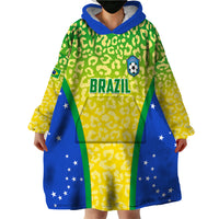 Wearable blanket hoodie, open front view, green leopard pattern with 'BRAZIL' and blue star sides