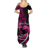 Women's black maxi dress with pink geometric print, off-shoulder sleeves, open-back straps