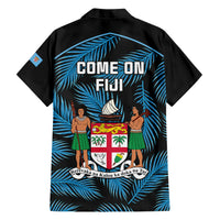 Black short-sleeve button-up shirt with blue palm leaf print and “COME ON FIJI” back