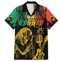 Black short-sleeve button-up shirt with reggae lion and microphone graphic, open collar.