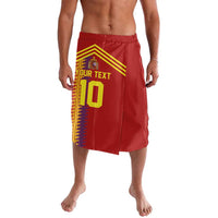 Red custom football shorts with bold yellow front graphic and elastic waistband