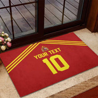 Red rubber doormat at doorway with yellow stripes, Spain crest, custom text and 10