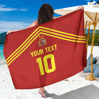 Red sarong held up, showing yellow stripes, crest, and 'YOUR TEXT 10' graphic