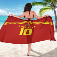 Red Spain-style sarong draped wide with 'YOUR TEXT 10' and yellow stripes