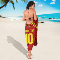 Red Spain-style sarong with yellow stripes and 'YOUR TEXT 10' print